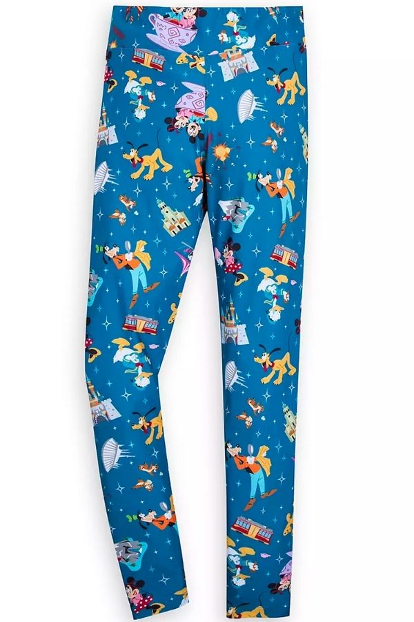 a blue pair of leggings with images of Goofy, Donald, Minnie, Mickey, and Pluto, as well as different Disney World and Disneyland attractions