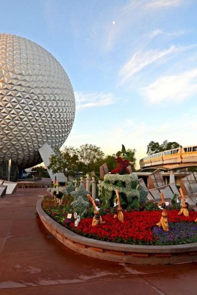 the entrance of Epcot, with spaceship earth in the background