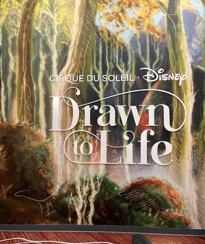 the drawn to life mural wall inside the cirque du soleil theater at disney springs