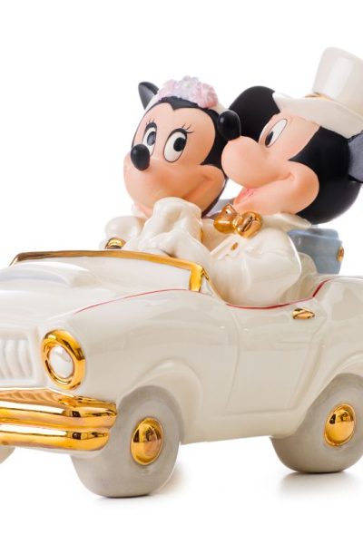 figurine of bride and groom Minnie and Mickey, riding in a "Just Married" car