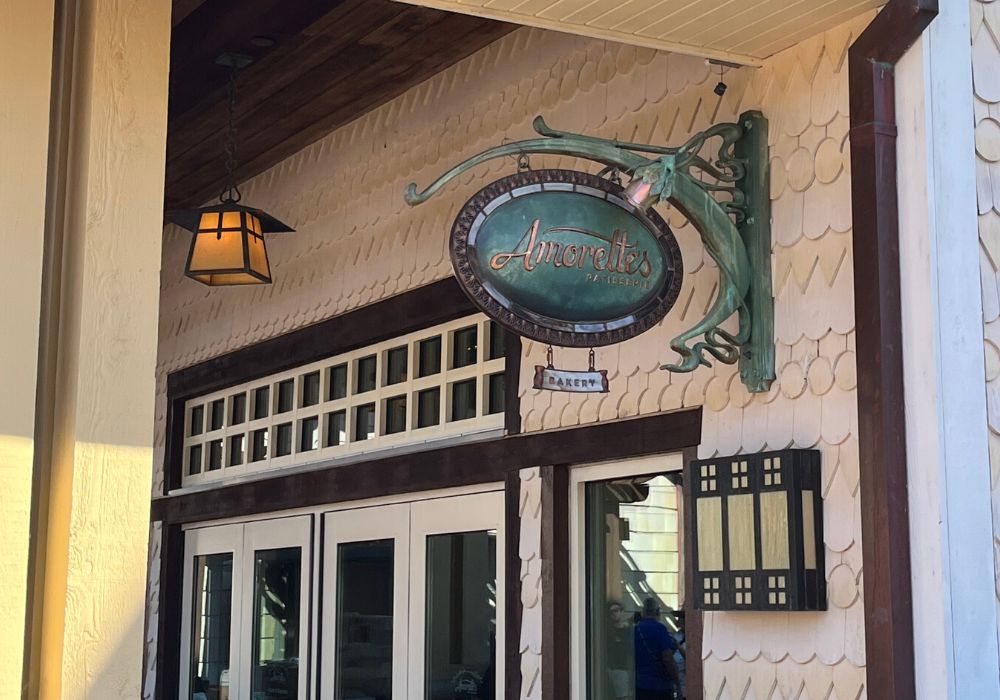 outdoor sign for amorette's patisserie, a bakery at disney springs